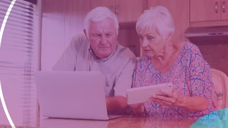 animation of happy caucasian senior couple with laptop screen over new home