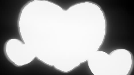 white energy heart shapes on a dark background