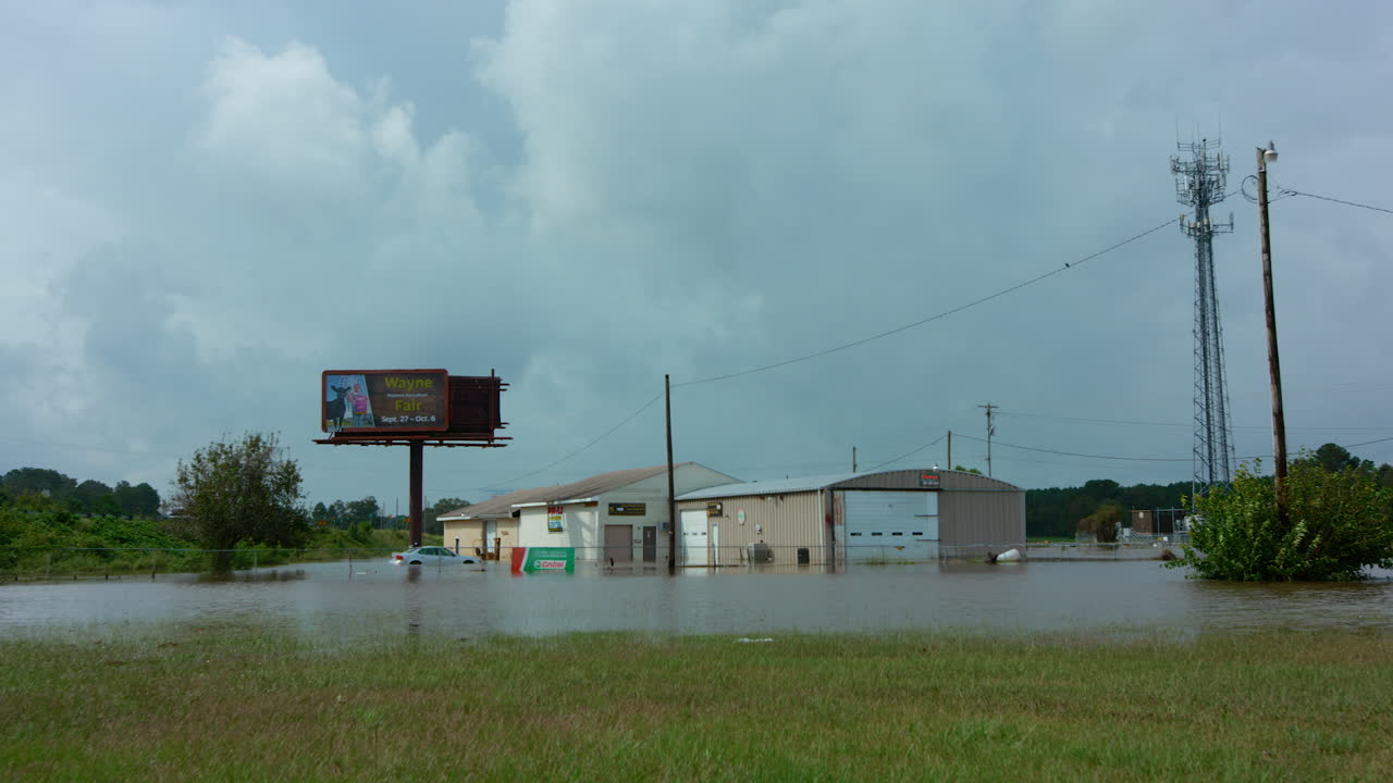 Flooded building and billboard after a storm