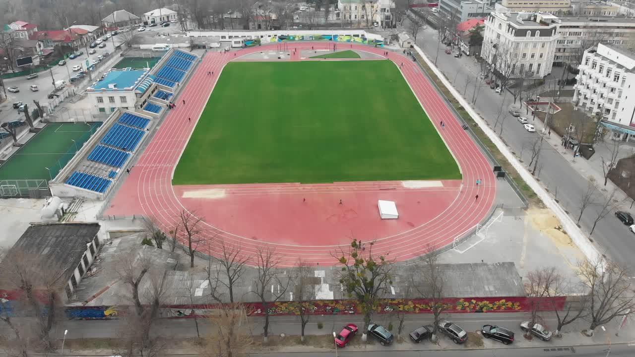 Aerial view of a stadium with track and field