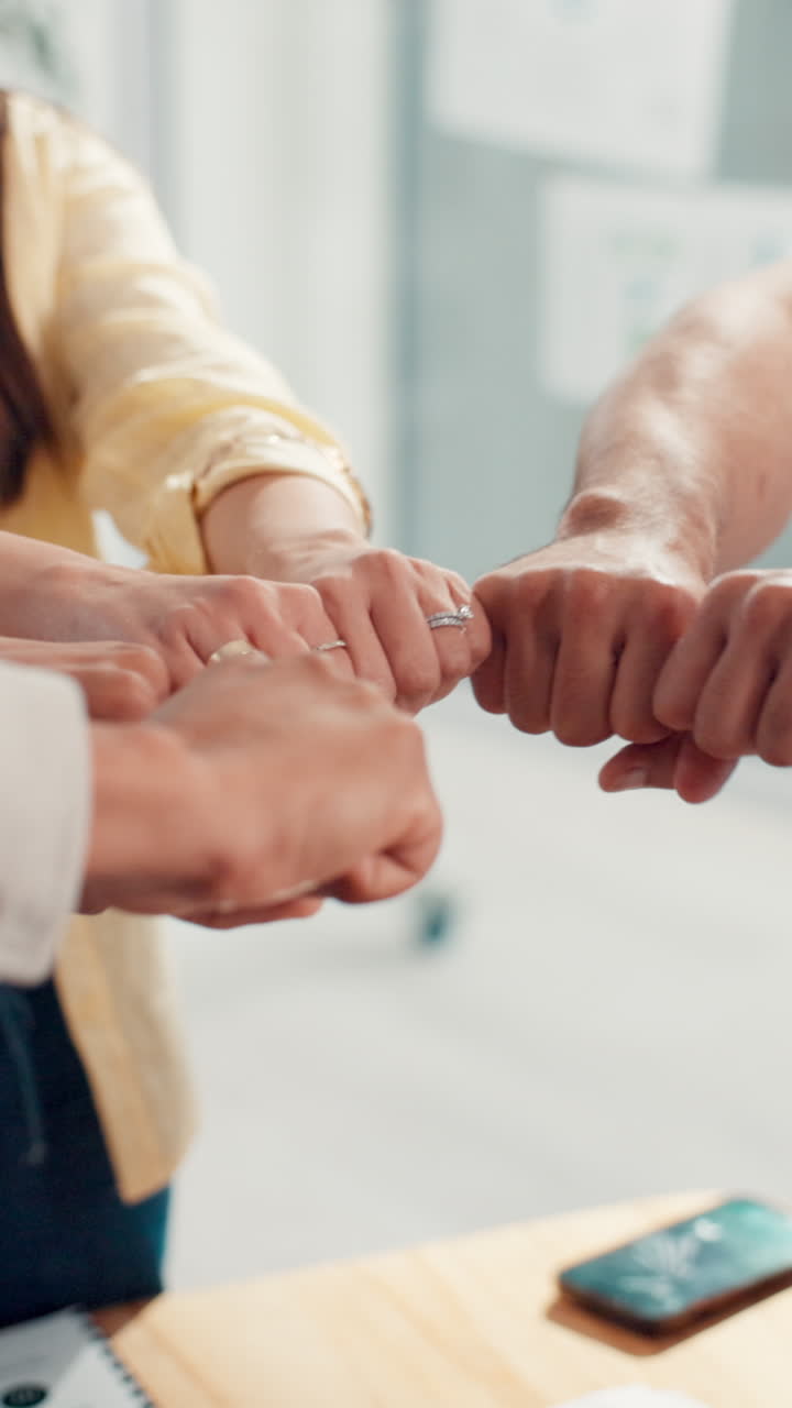 Close-up of Team Doing a Fist Bump for Collaboration and Unity