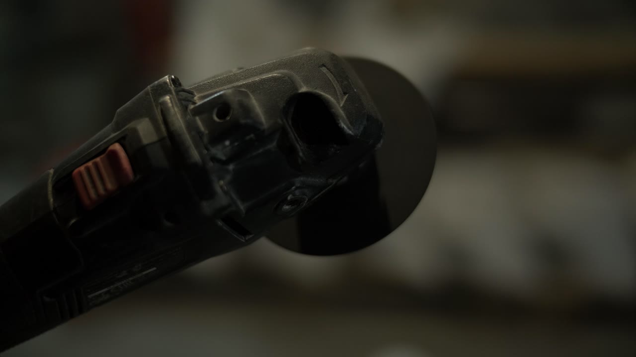 Close-up of an Angle Grinder with Spinning Disc