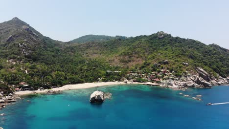 pan over amazing tanote bay beach in koh tao, thailand, with a drone