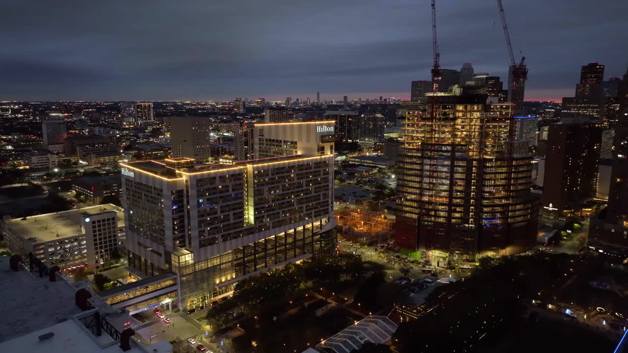 Aerial view around the Hilton Americas and the Skanska 1550 on the green construction site, in Houston, USA