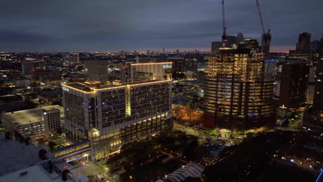 aerial view around the hilton americas and the skanska 1550 on the green construction site, in houston, usa