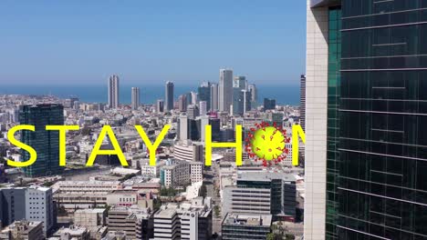 stay home message over tel aviv cityscape during pandemic