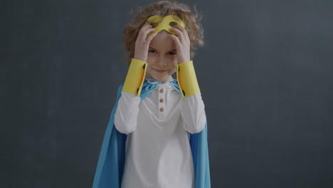 child dressed as superhero
