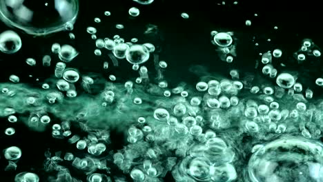 water oil bubbles  behind glass background