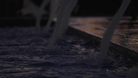 close up of water fountain at sunset