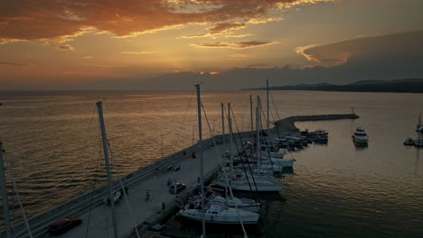 sunset at the marina with sailboats and yachts