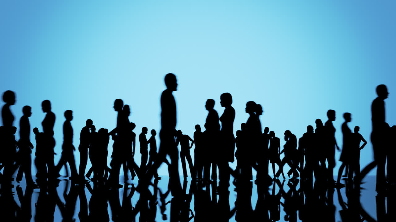 Premium stock video - Silhouettes of a crowd of people spread out over ...