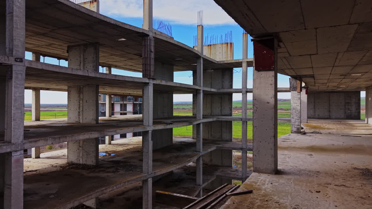 Exploring an unfinished building with views of the countryside