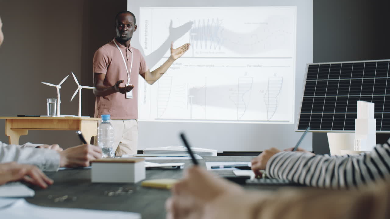 African American Man Giving Presentation about Renewable Energy