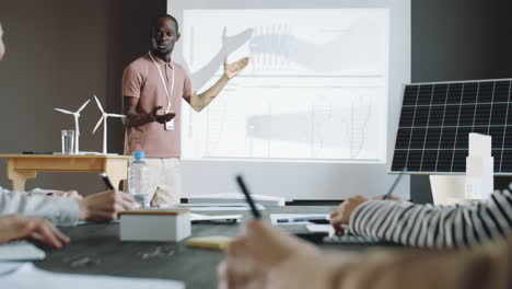 african american man giving presentation about renewable energy