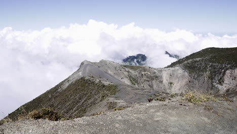 volcanic crater landscape above the clouds