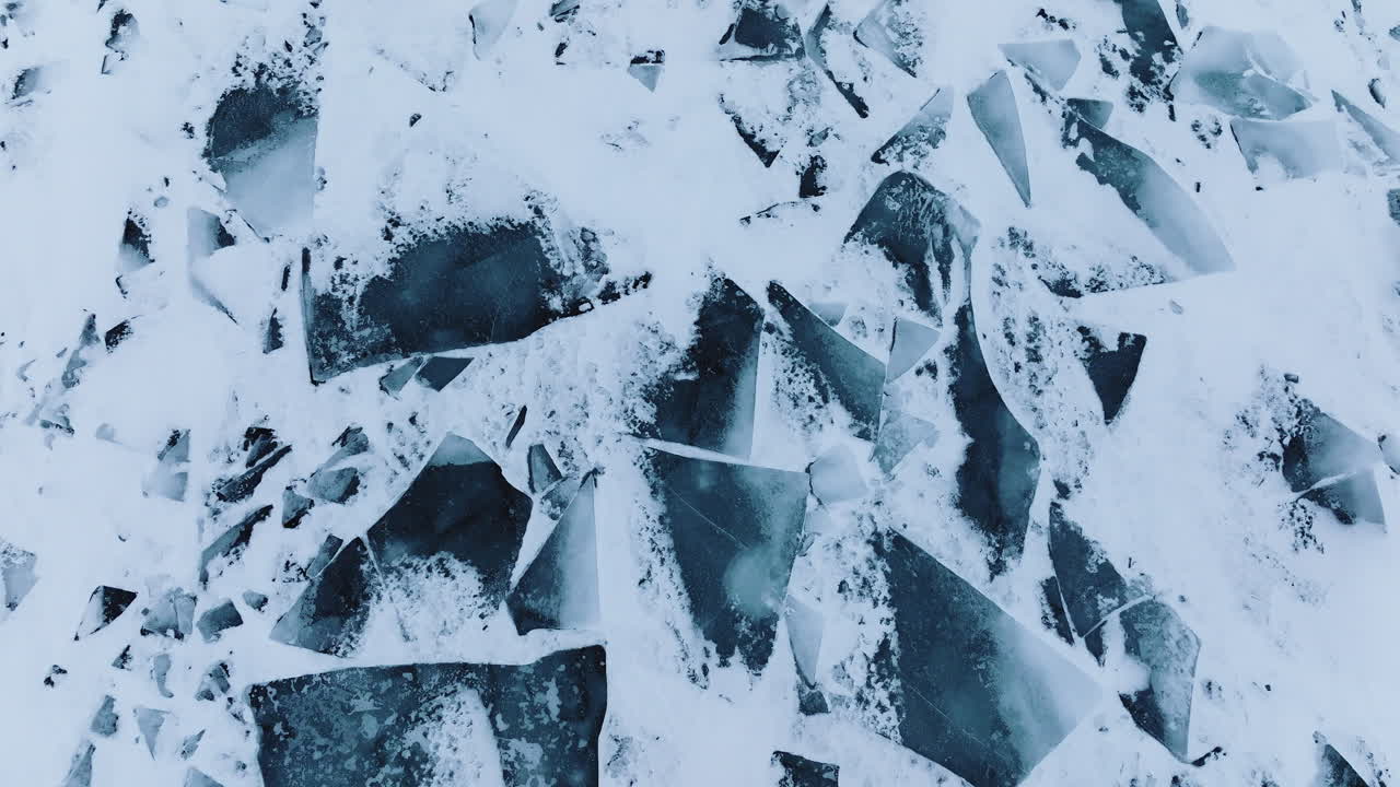Aerial perspective capturing the crystalline beauty of Lake Michigan's frozen surface