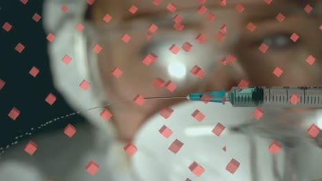 animation of rows of pink cubes over female caucasian scientist holding syringe