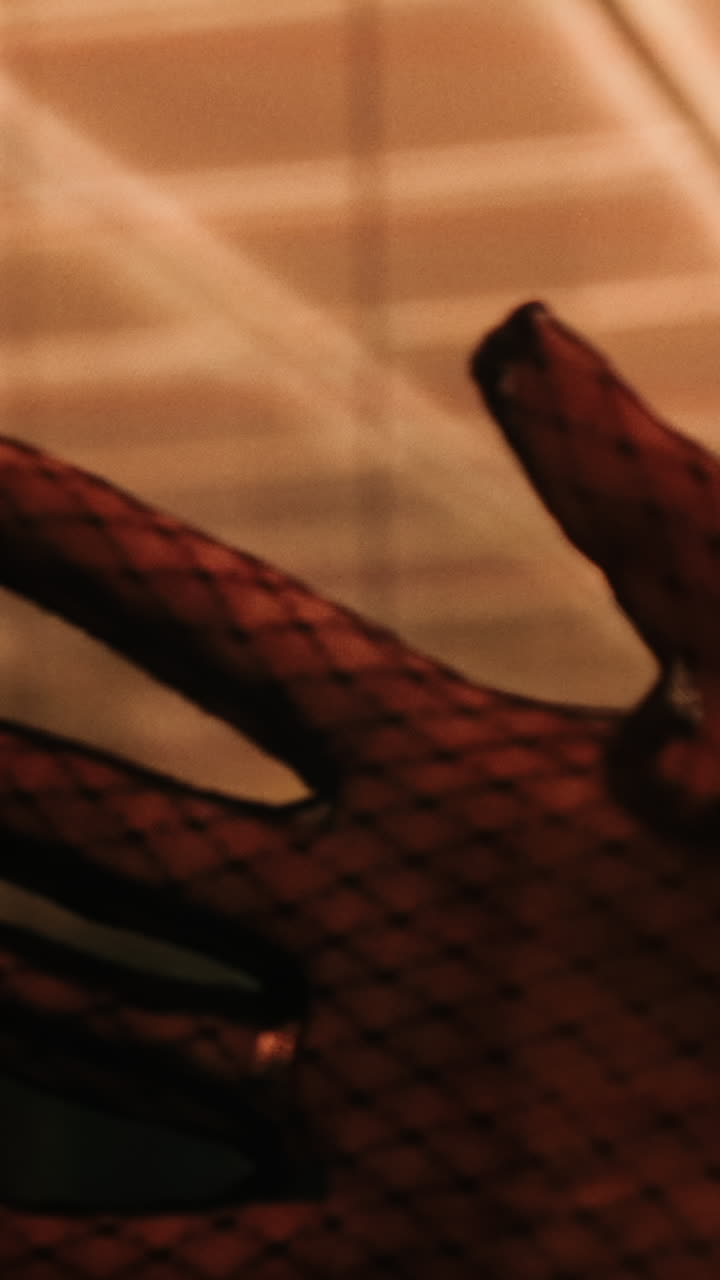 Close-up of a lace glove in different lighting