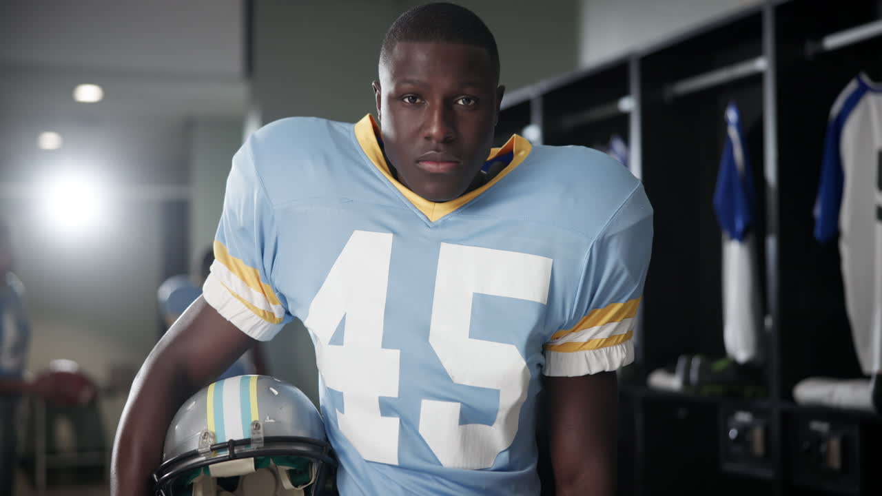 Football Player in Locker Room