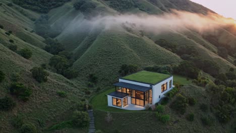 modern house nestled in the mountains