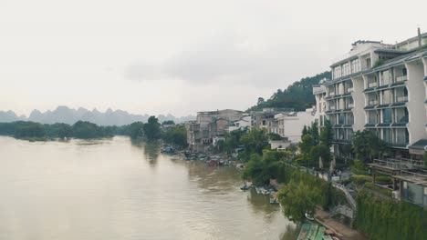 Flood-in-China,-River-Lijiang-Causing-Natural-Disaster-in-Mainland,-Aerial