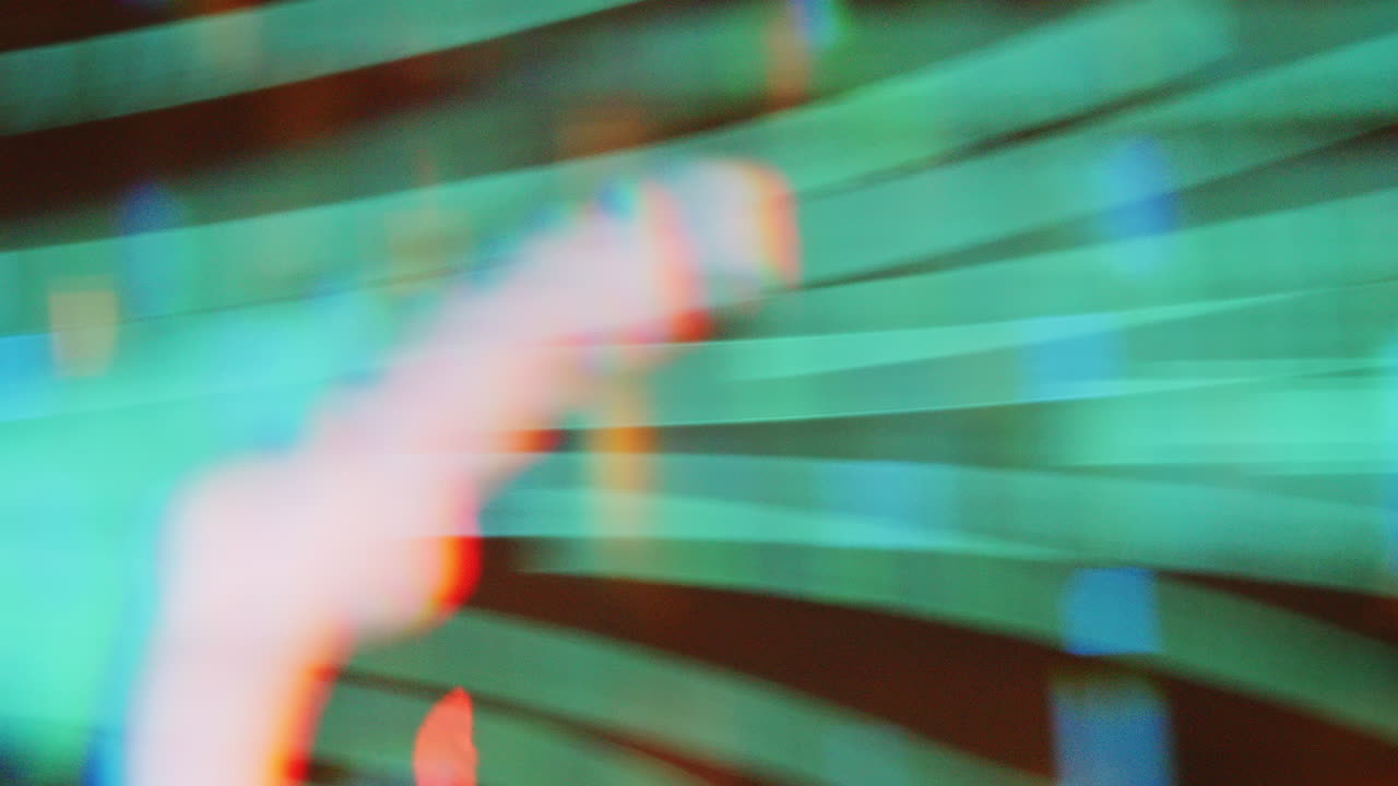 Abstract Colorful Bokeh Lights and Green Light Trails Moving Dynamically