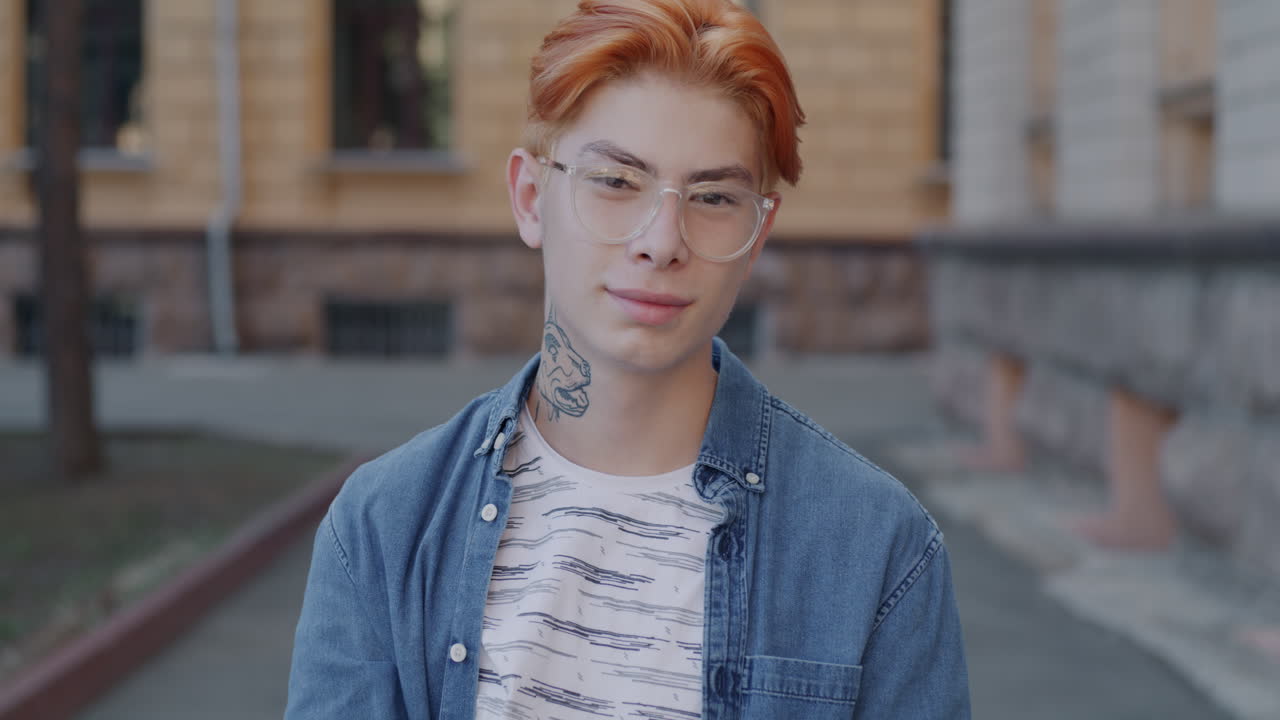Young Man with Ginger Hair and Glasses
