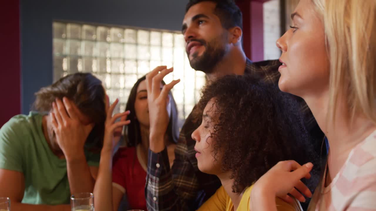 Friends at the bar in a pub during the day