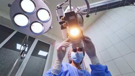 modern microscope for eye operation at the hospital. health care concept. doctor preparing for operation, eye desease treatment.
