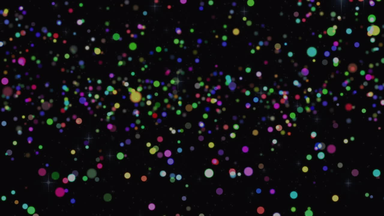 Animation of glowing multi coloured spots over black background