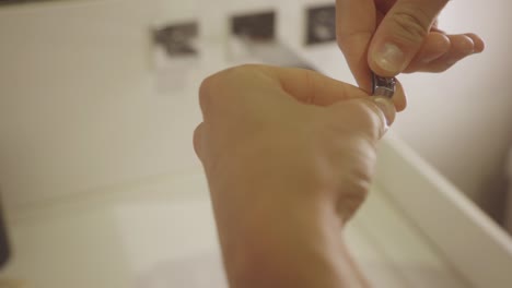 close up of man nail clipping