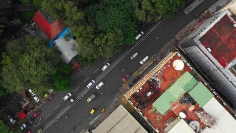 parque de tráfico de la ciudad de bangalore calle aérea de arriba hacia abajo panorama 4k india