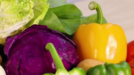 assorted vegetables arranged on a white background