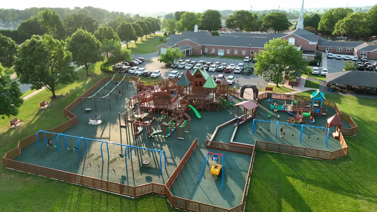 Aerial orbit of large new outdoor playground