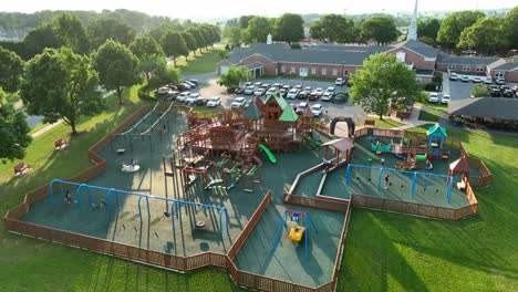 aerial orbit of large new outdoor playground