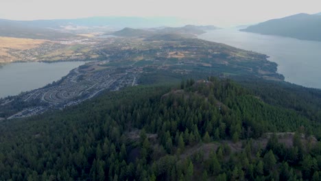 vast panoramic viewpoint in canadian mountains overlooking okanagan lake and wood lake in lakecountry in british columbia's spion kop mt