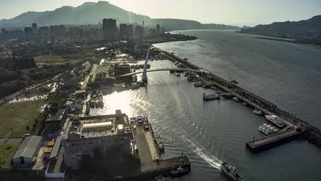 drone poi hyper lapse of a small harbor in china at sunrise