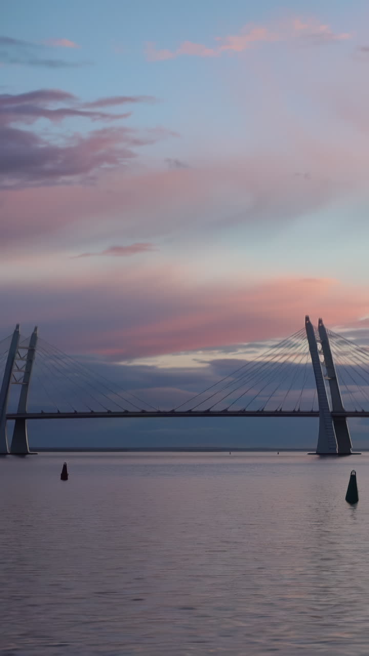 Cable-Stayed Bridge at Sunrise/Sunset over a River