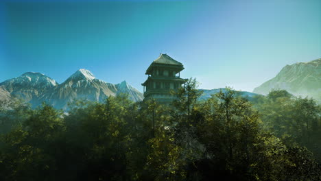 a pagoda stands tall in a forest at the base of a mountain range