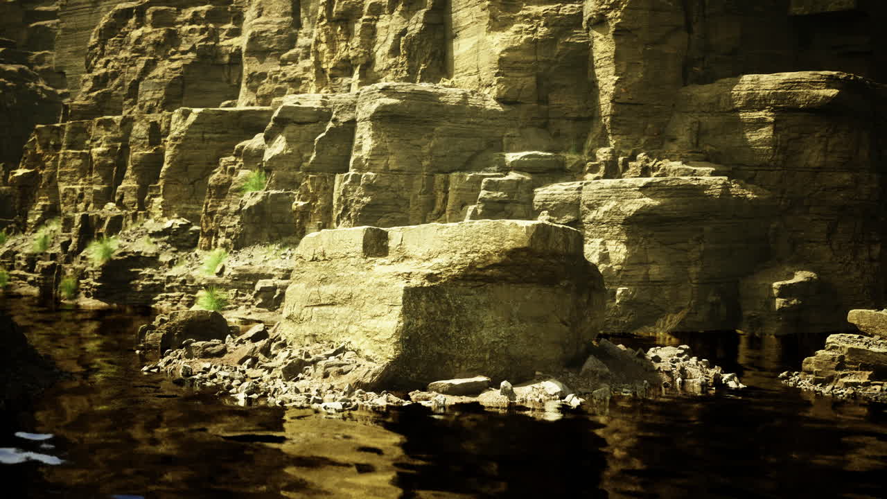 Majestic rock formations reflect in calm waters at dusk