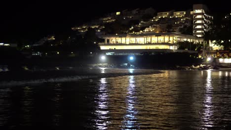 night beach on a background of city lights. night shooting