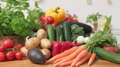 Wooden-kitchen-worktop-with-organic-colorful-vegetables