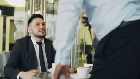 business meeting at a cafe