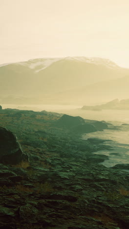 majestic dawn breaks over rugged mountains reflecting in serene waters