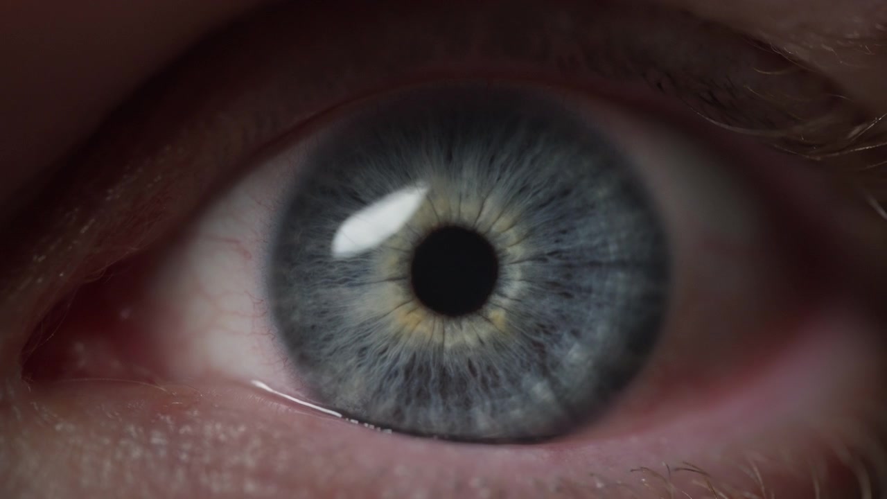 Blue eye opening widely