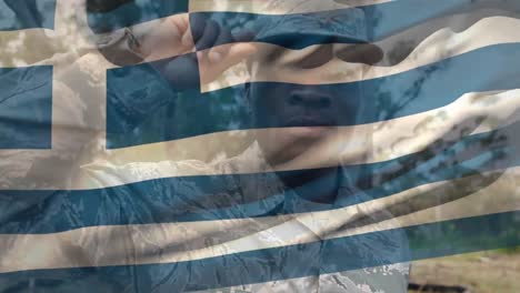 Animation-of-flag-of-greece-over-african-american-male-soldier