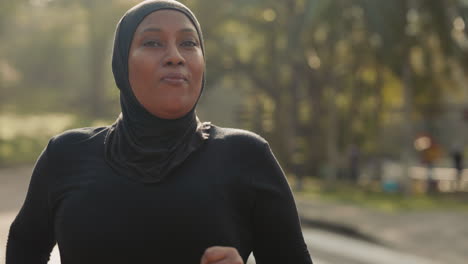 muslim woman exercising in a park