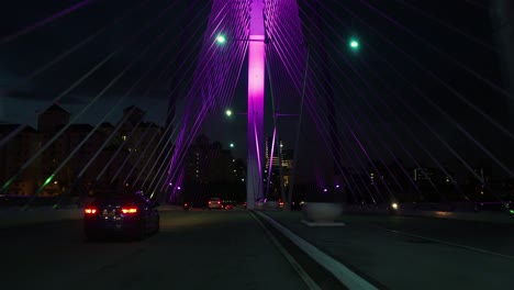 first person view driving across seri wawasan bridge in putrajaya, malaysia at night