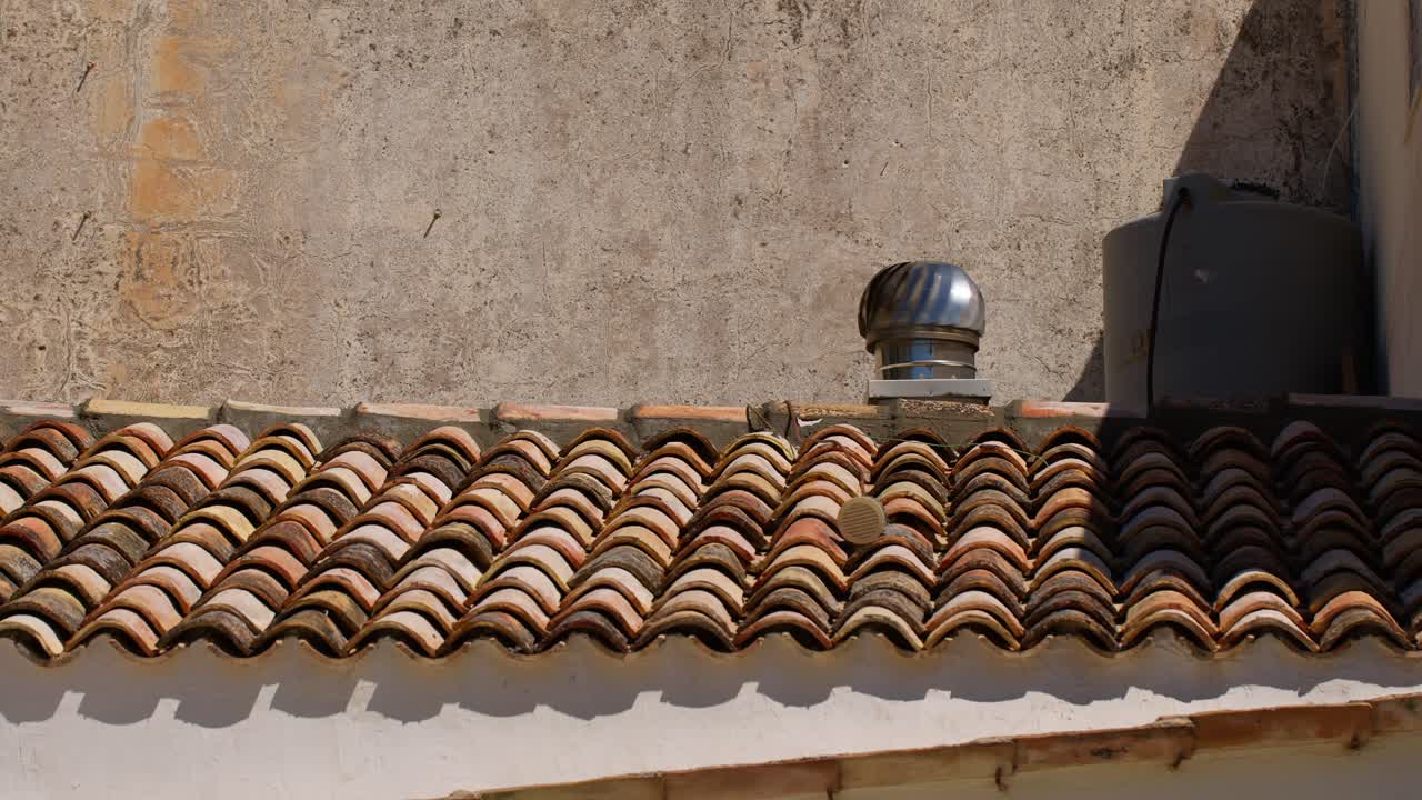 Charming Sicilian rooftop in bright sun, capturing rustic beauty and calm