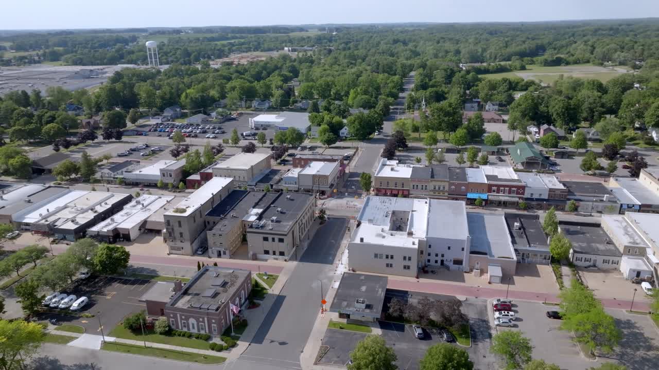 Downtown Fremont, Michigan with drone video moving in a circle